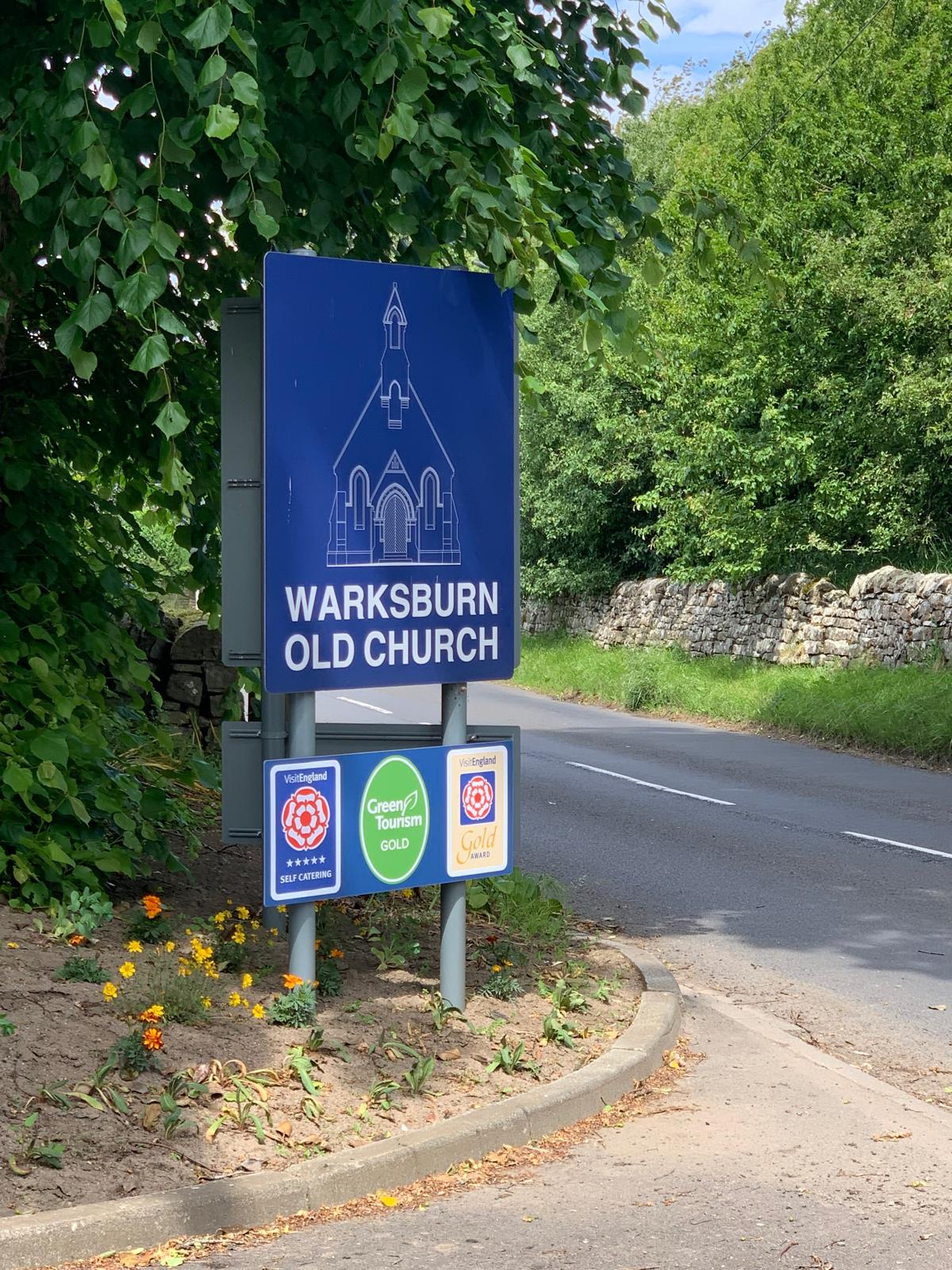 Warksburn Old Church Road Sign